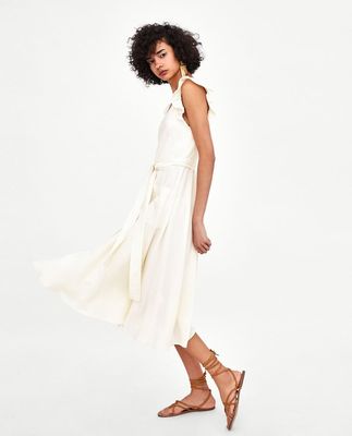 Elegant white linen maxi woman dress with bow